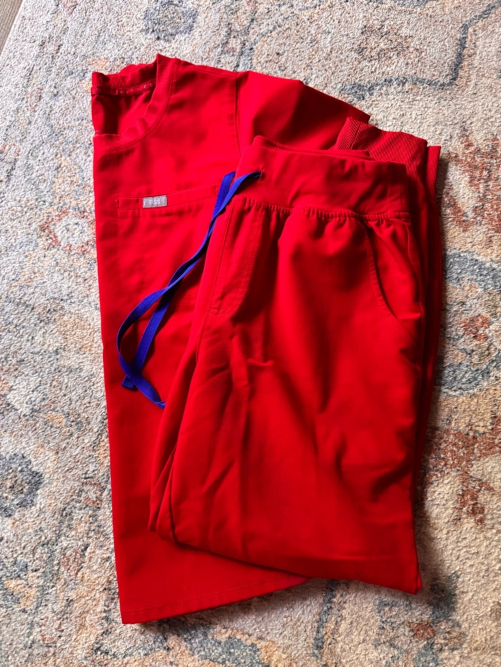 Figs winning red with blue tie. Sold out color!